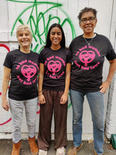 Load image into Gallery viewer, Three women wearing "No Bad Women Just Bad Laws" t-shirts of different sizes and styles.